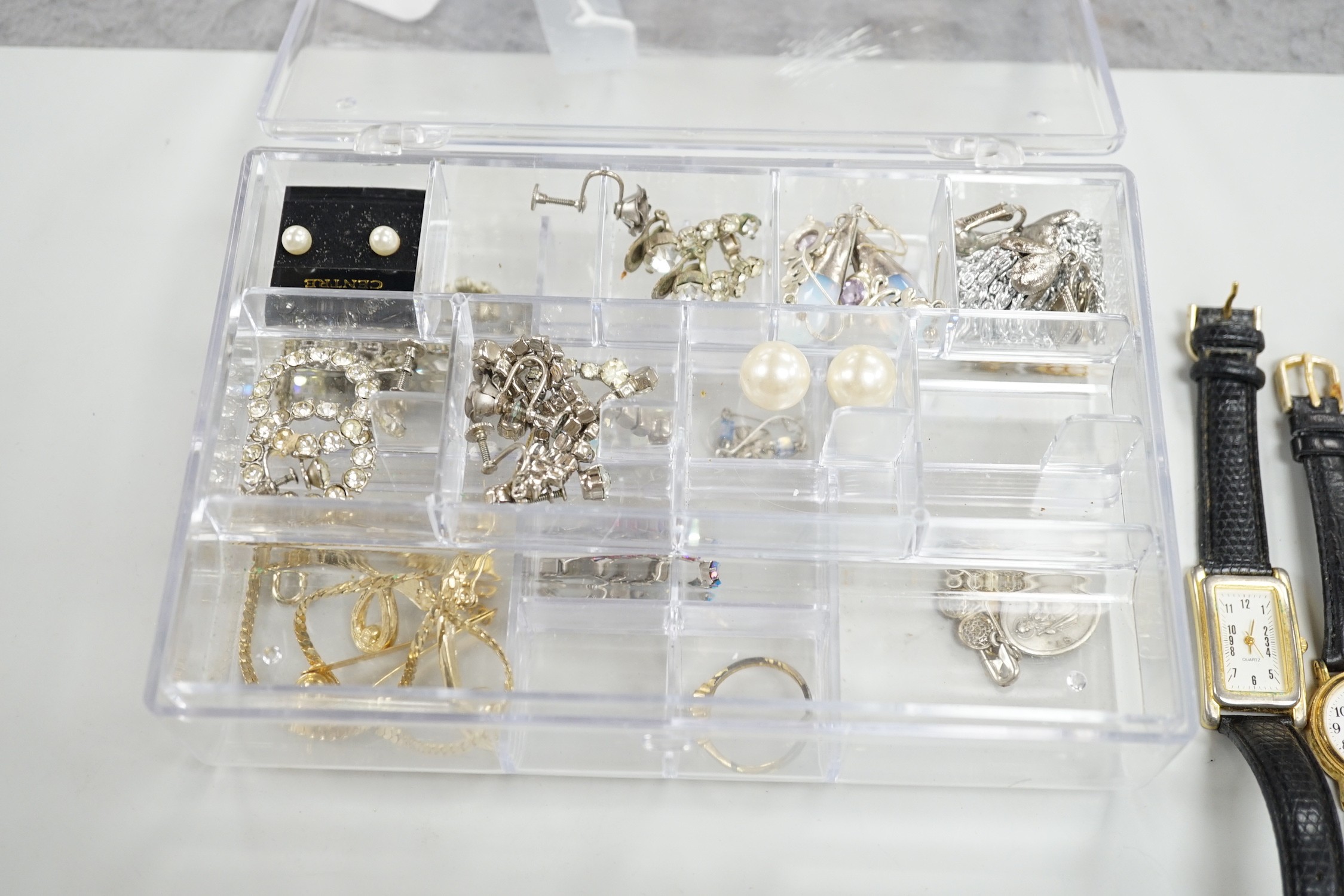 A small quantity of assorted costume jewellery and wrist watches.